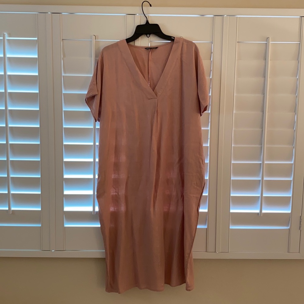Pink kaftan.